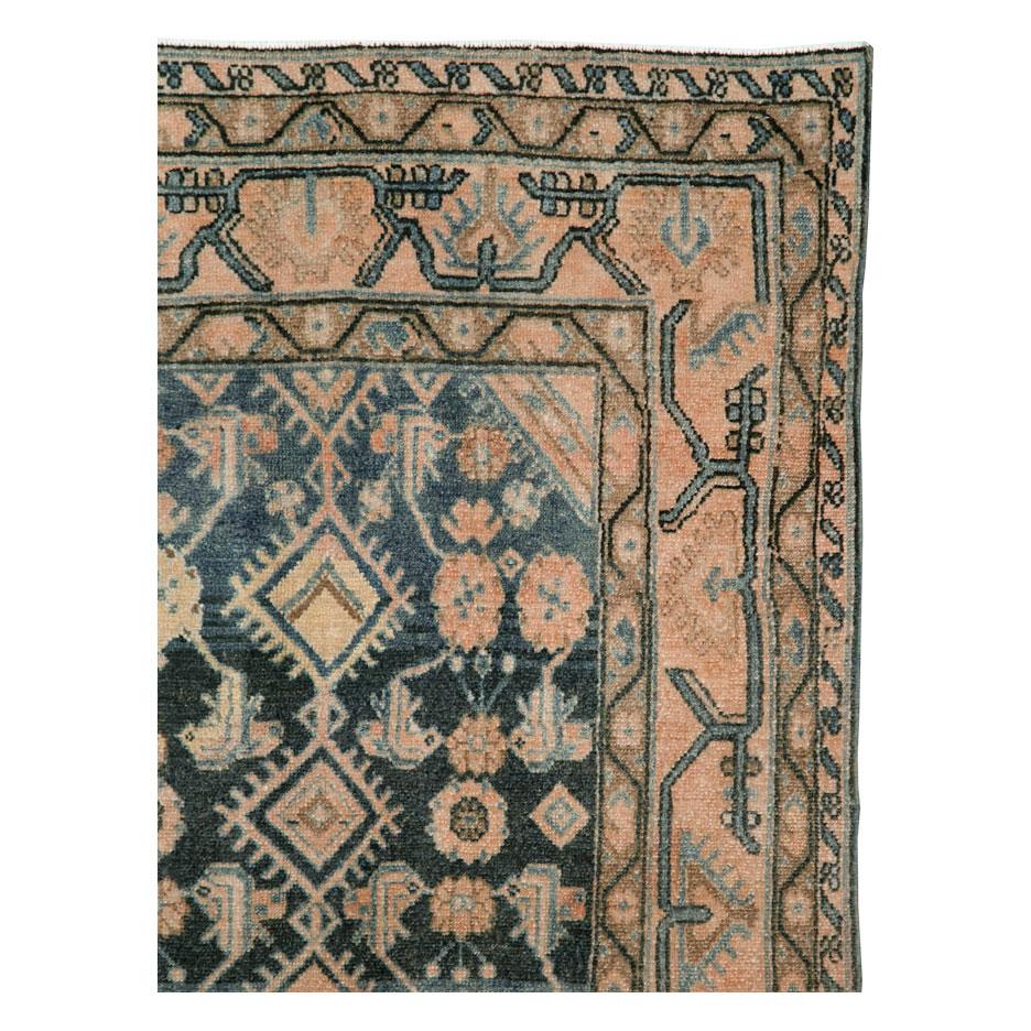 A vintage Persian Malayer throw rug handmade during the mid-20th century.

Measures: 3' 6