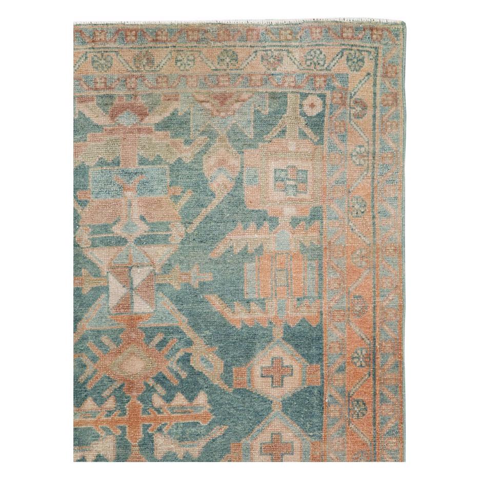 A vintage Persian Malayer throw rug handmade during the mid-20th century.

Measures: 3' 8