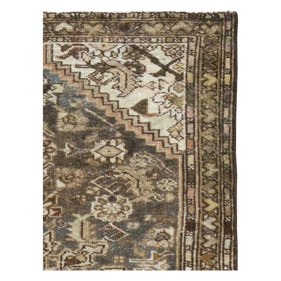 A vintage Persian Malayer throw rug handmade during the mid-20th century.

Measures: 2' 7