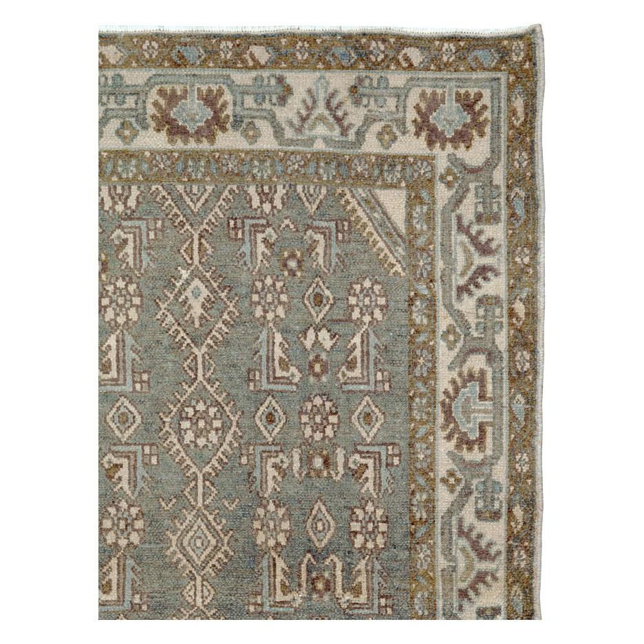 A vintage Persian Malayer throw rug handmade during the mid-20th century in shades of grey and brown.

Measures: 3' 7