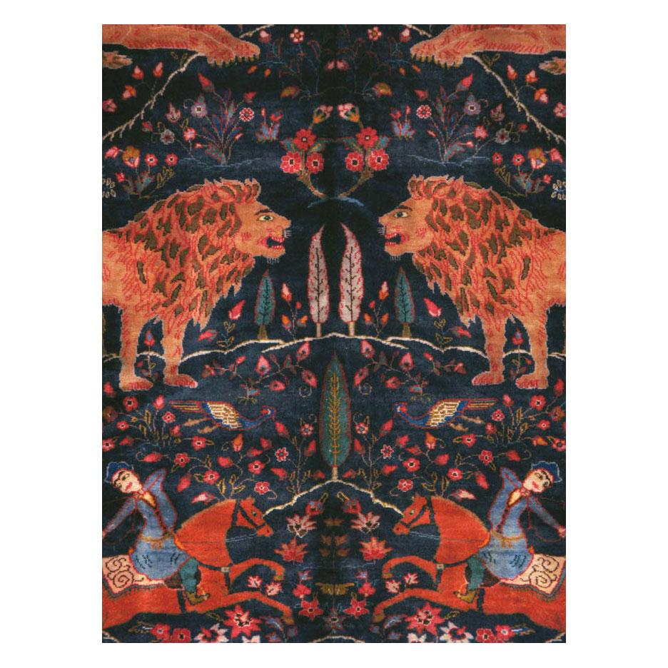 A vintage Persian Mashad pictorial room size carpet handmade during the mid-20th century.

Measures: 8'2