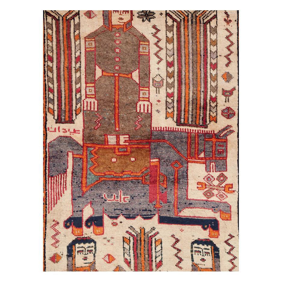 A vintage Persian pictorial gallery format rug handmade by the Bakhtiari tribe during the mid-20th century.

Measures: 4' 10