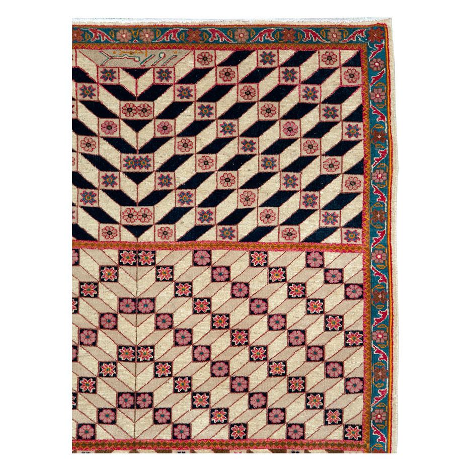 A vintage Persian Tabriz throw rug, with an Art Deco style geometric pattern, handmade during the mid-20th century.

Measures: 3' 6