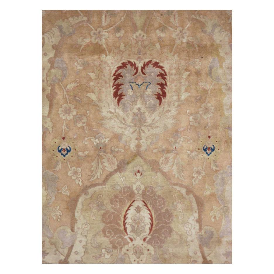 Un tappeto persiano Tabriz vintage di grandi dimensioni realizzato a mano a metà del XX secolo.

Misure: 12' 11