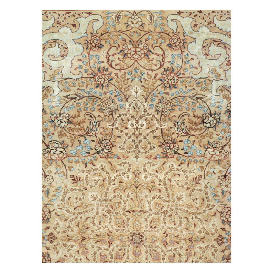 A vintage Persian Tabriz room size carpet handmade during the mid-20th century.

Measures: 8' 3