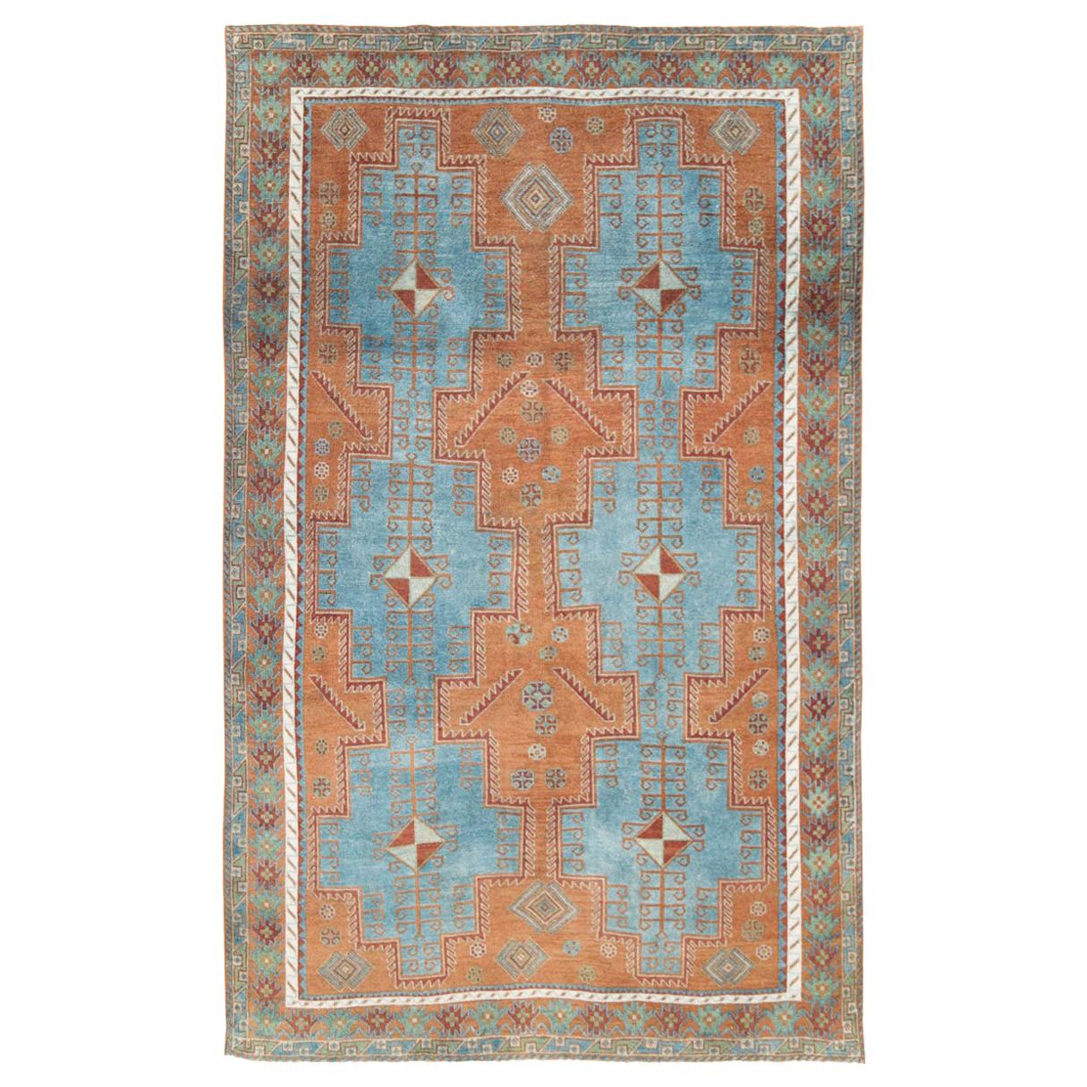 Mid-20th Century Handmade Persian Tribal Accent Rug in Orange, Blue, and Green