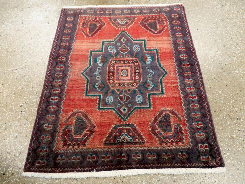 A vintage Persian tribal style Hamadan throw rug in square format handmade during the mid-20th century.

Measures: 2' 2