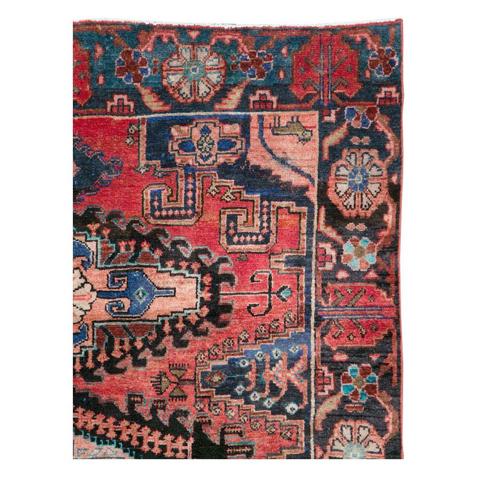 A vintage Persian Veece small accent carpet handmade during the mid-20th century.

Measures: 5' 3