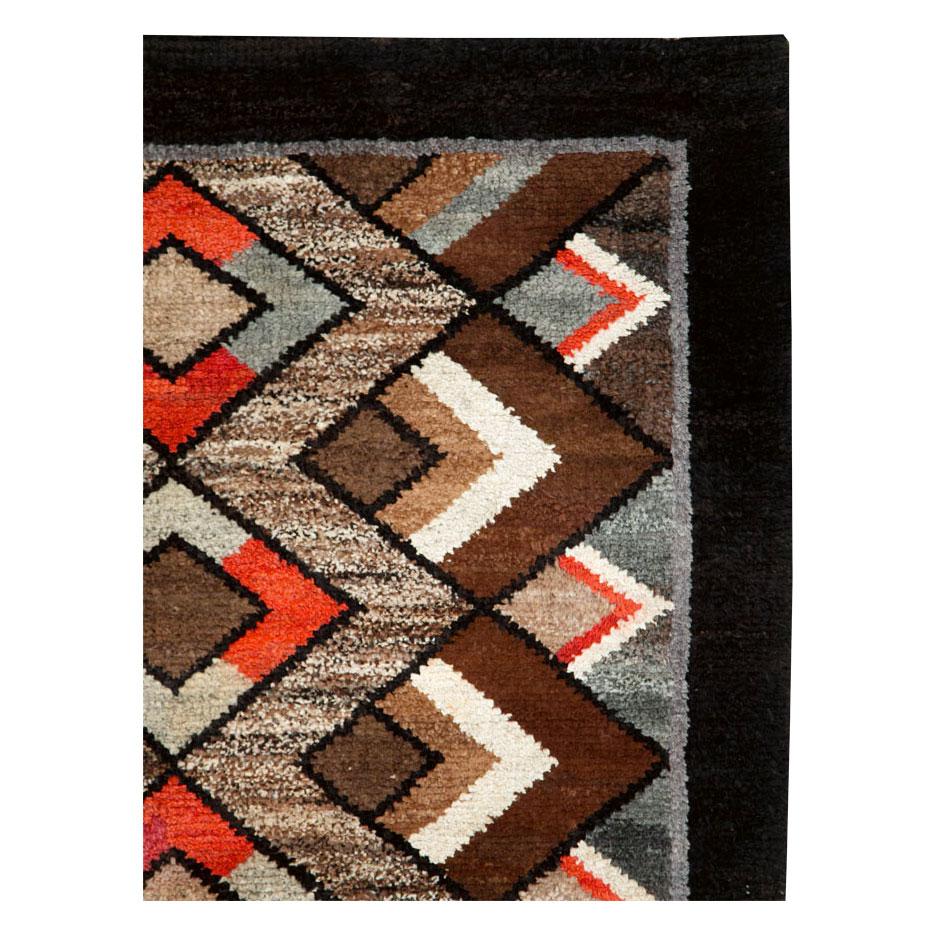 A vintage Polish geometric Art Deco style accent rug handmade during the mid-20th century.

Measures: 4' 0