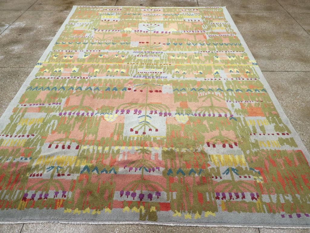 A vintage Swedish Art Deco room size carpet handmade during the mid-20th century.

Measures: 8' 5