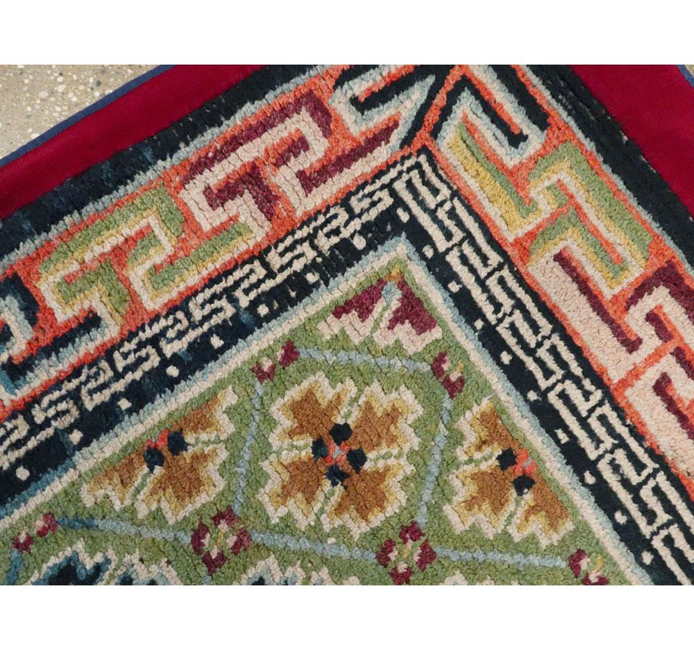 Mid-20th Century Handmade Tibetan Throw Rug In Excellent Condition For Sale In New York, NY