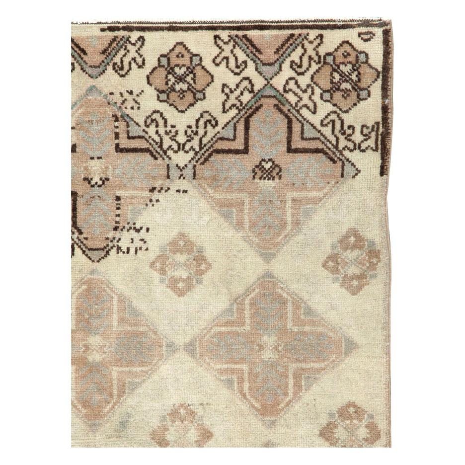 A vintage Turkish Anatolian accent rug handmade during the mid-20th century.

Measures: 3' 6