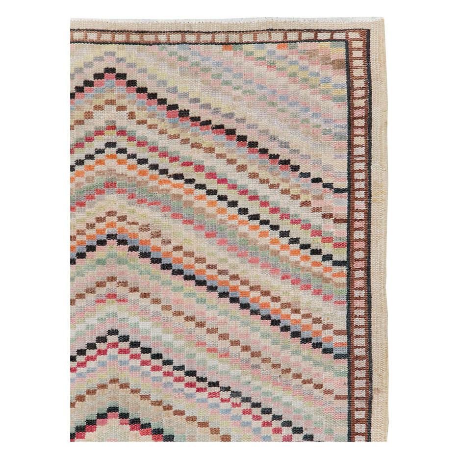 A vintage Turkish Anatolian accent rug handmade during the mid-20th century.

Measures: 4' 2