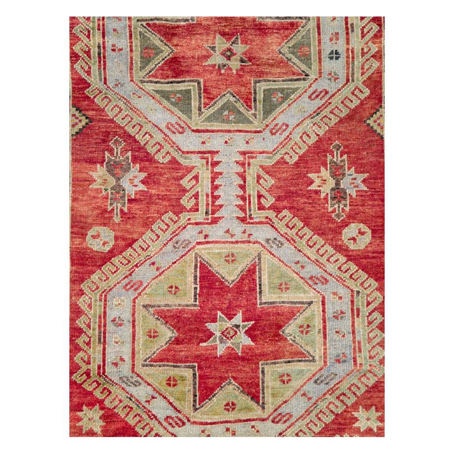 A vintage Turkish Anatolian gallery carpet handmade during the mid-20th century.

Measures: 5' 1