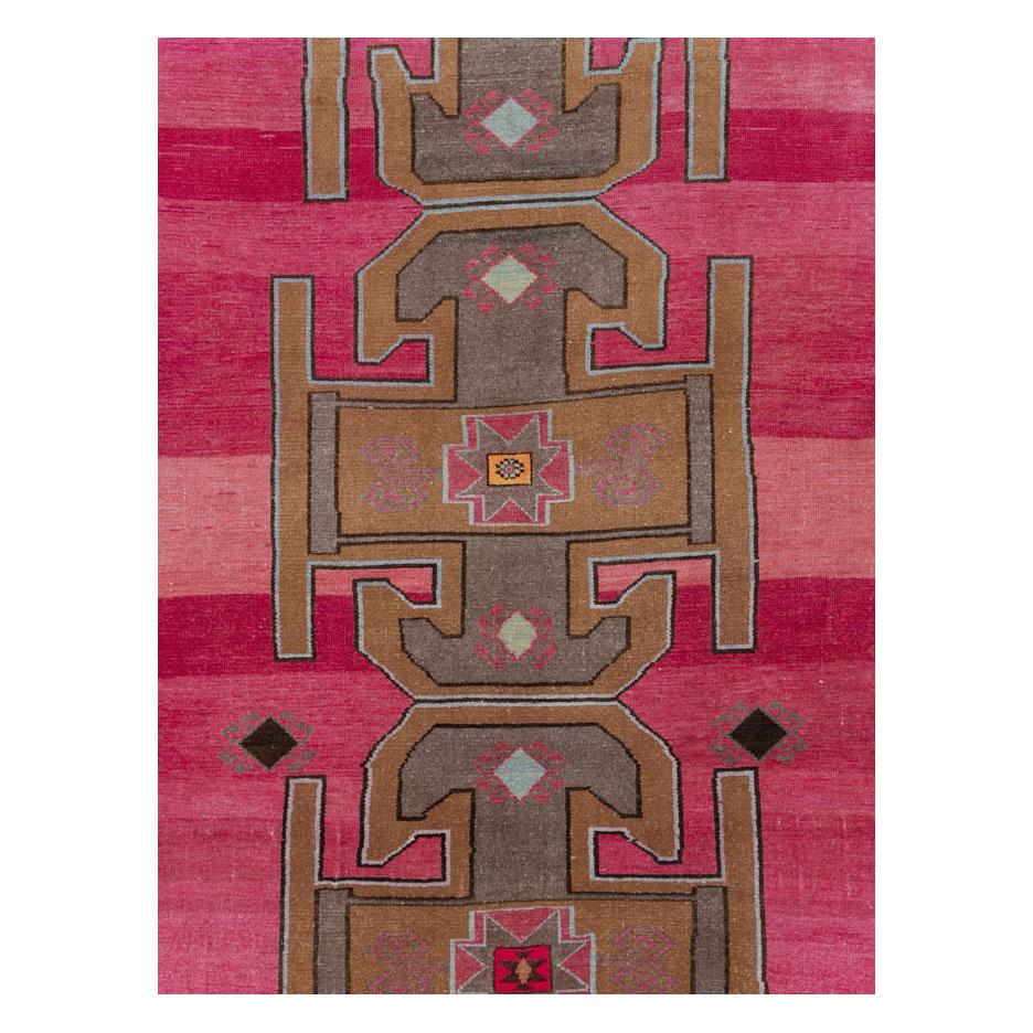 A vintage Turkish Anatolian long & narrow gallery carpet handmade during the mid-20th century.

Measures: 7' 4