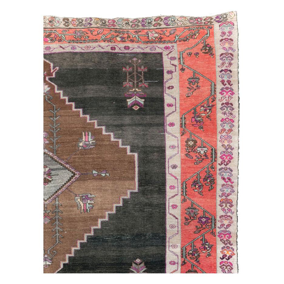 A vintage Turkish Anatolian room size carpet handmade during the mid-20th century.

Measures: 10' 5
