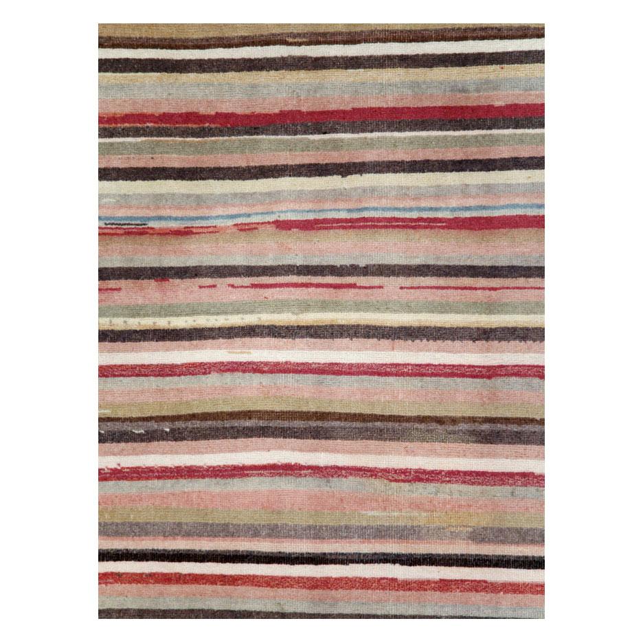 A vintage Turkish Anatolian modern style rug in runner format handmade during the mid-20th century.

Measures: 3' 10