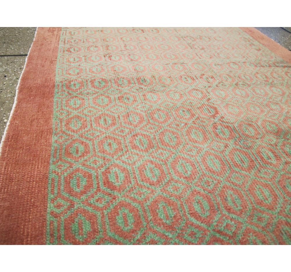 Hand-Knotted Mid-20th Century Handmade Turkish Anatolian Runner Rug in Light Green and Coral For Sale