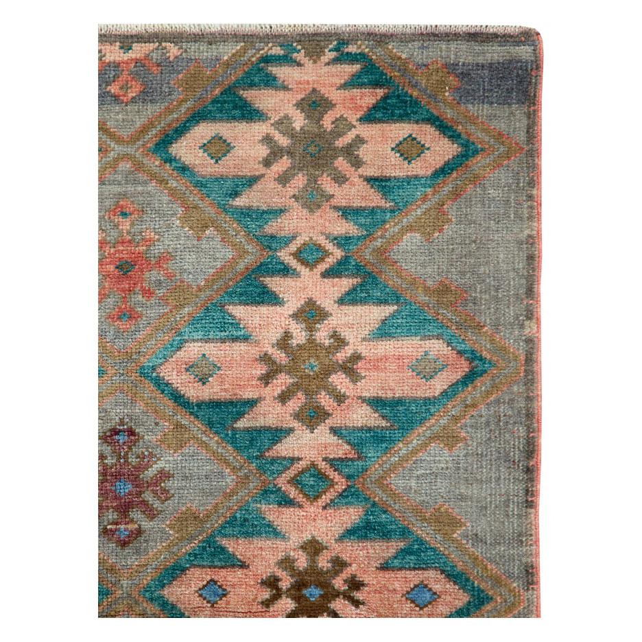 A vintage Turkish Anatolian small throw rug handmade during the mid-20th century.

Measures: 3' 5