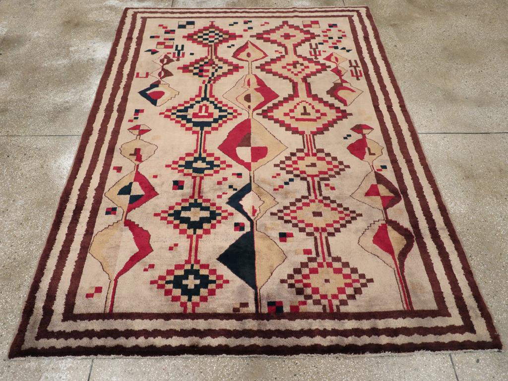 A vintage Turkish Anatolian tribal accent rug handmade during the mid-20th century.

Measures: 6' 7