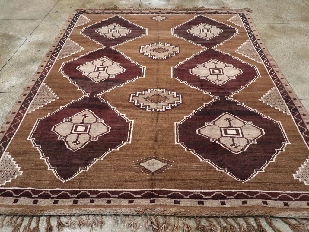 A vintage Turkish Anatolian tribal room size carpet handmade during the mid-20th century.

Measures: 9' 3