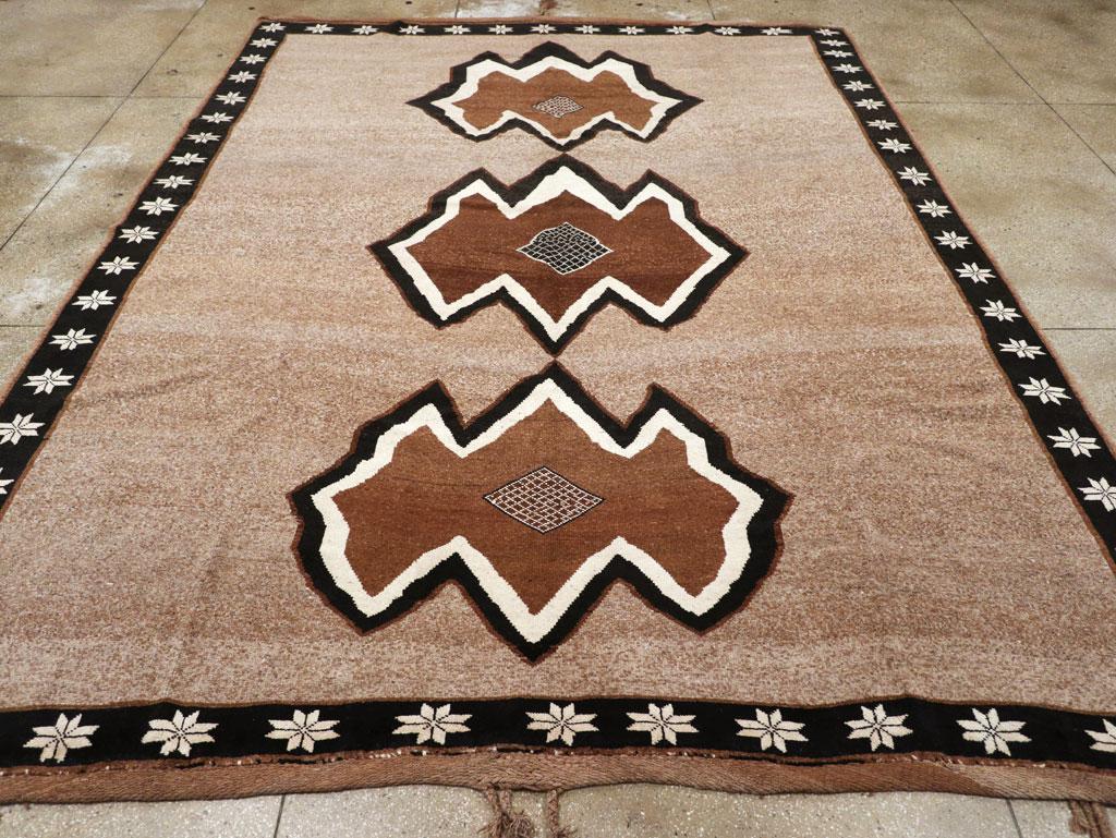 A vintage Turkish Anatolian tribal room size carpet handmade during the mid-20th century.

Measures: 10' 8