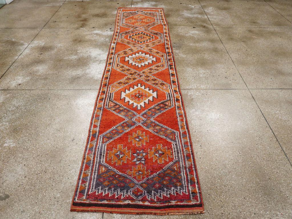 A vintage Turkish Anatolian tribal runner handmade during the mid-20th century.

Measures: 3' 0