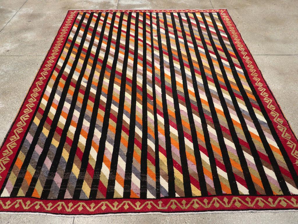 A vintage Turkish Art Deco style small room size carpet handmade during the mid-20th century.

Measures: 7' 8