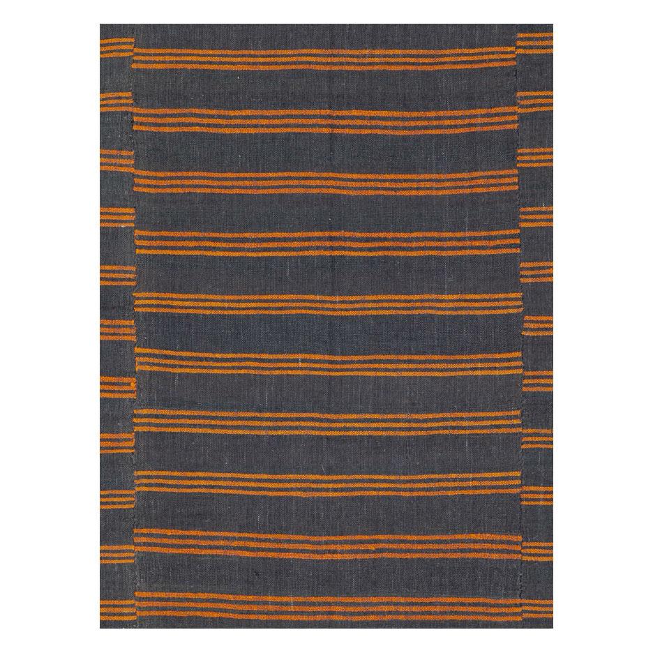 A vintage Turkish flat-weave Kilim accent rug handmade during the mid-20th century.

Measures: 6' 0
