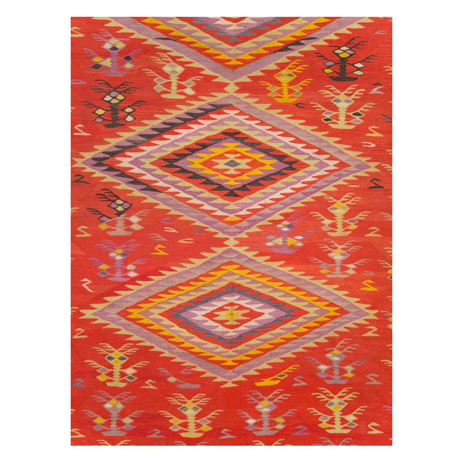 Un tappeto turco vintage a tessitura piatta Kilim di grandi dimensioni realizzato a mano a metà del XX secolo.

Misure: 12' 4