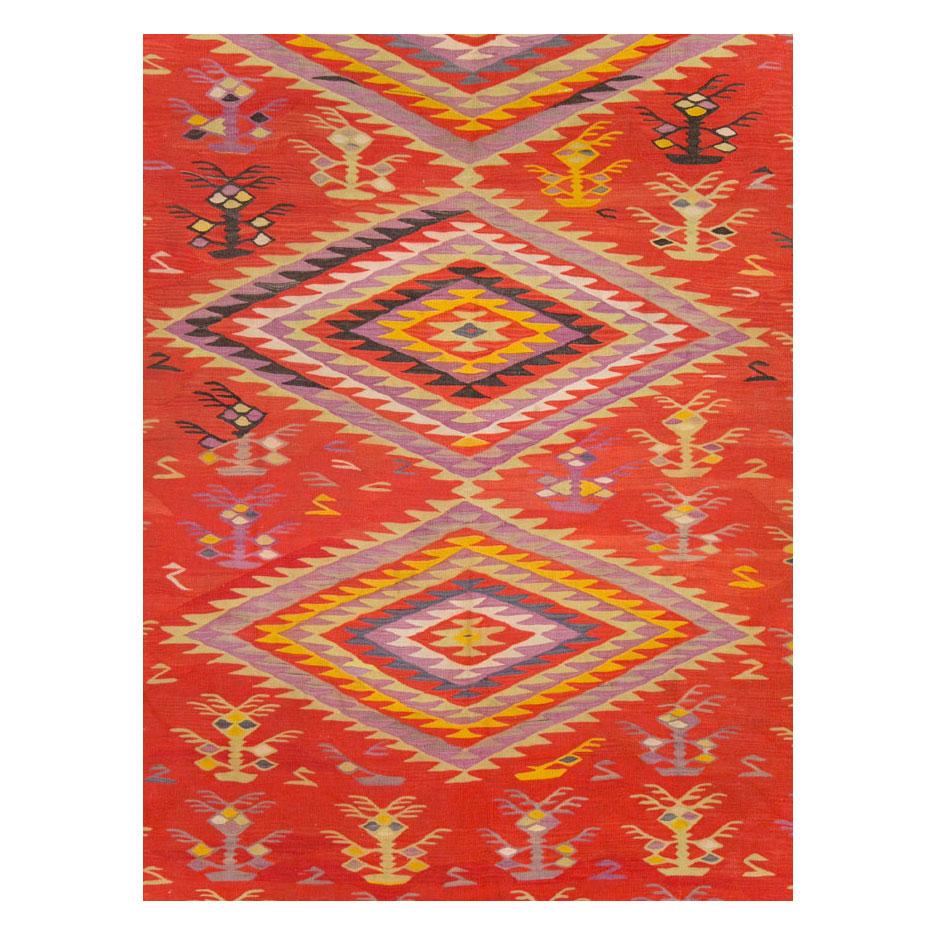 A vintage Turkish flatwoven Kilim large room size rug handmade during the mid-20th century.

Measures: 12' 4