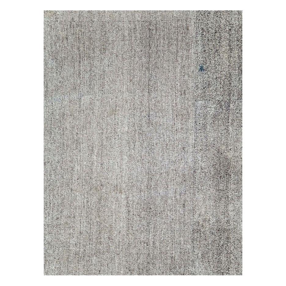 A vintage Turkish flat-weave Kilim large room size carpet handmade during the mid-20th century with a salt and pepper pattern in shades of grey.

Measures: 12' 4