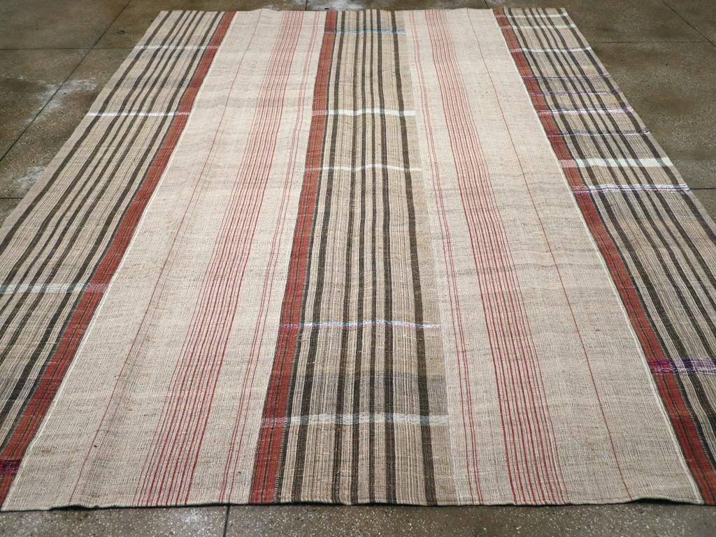 A vintage Turkish flatweave Kilim room size carpet handmade during the mid-20th century.

Measures: 10' 4