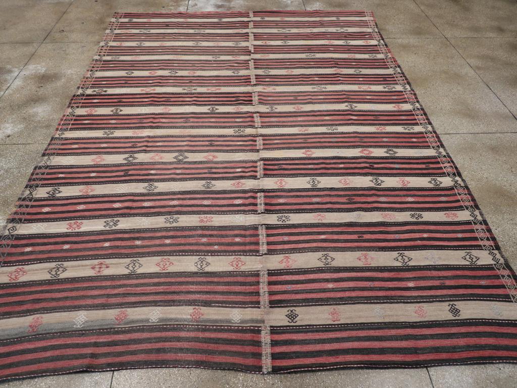 A vintage Turkish flatweave Kilim room size carpet handmade during the mid-20th century.

Measures: 9' 10