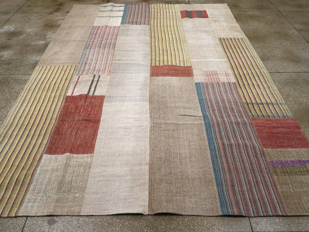 A vintage Turkish flatweave Kilim room size carpet handmade during the mid-20th century.

Measures: 8' 8