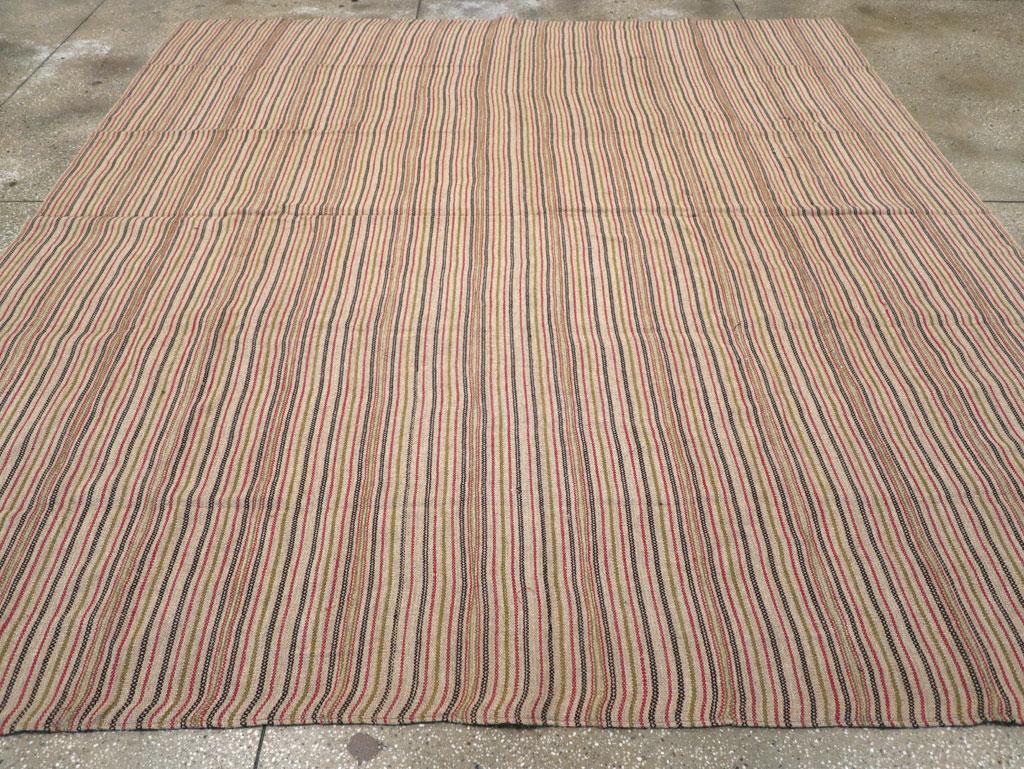 A vintage Turkish flatweave Kilim square room size carpet handmade during the mid-20th century.

Measures: 9' 6