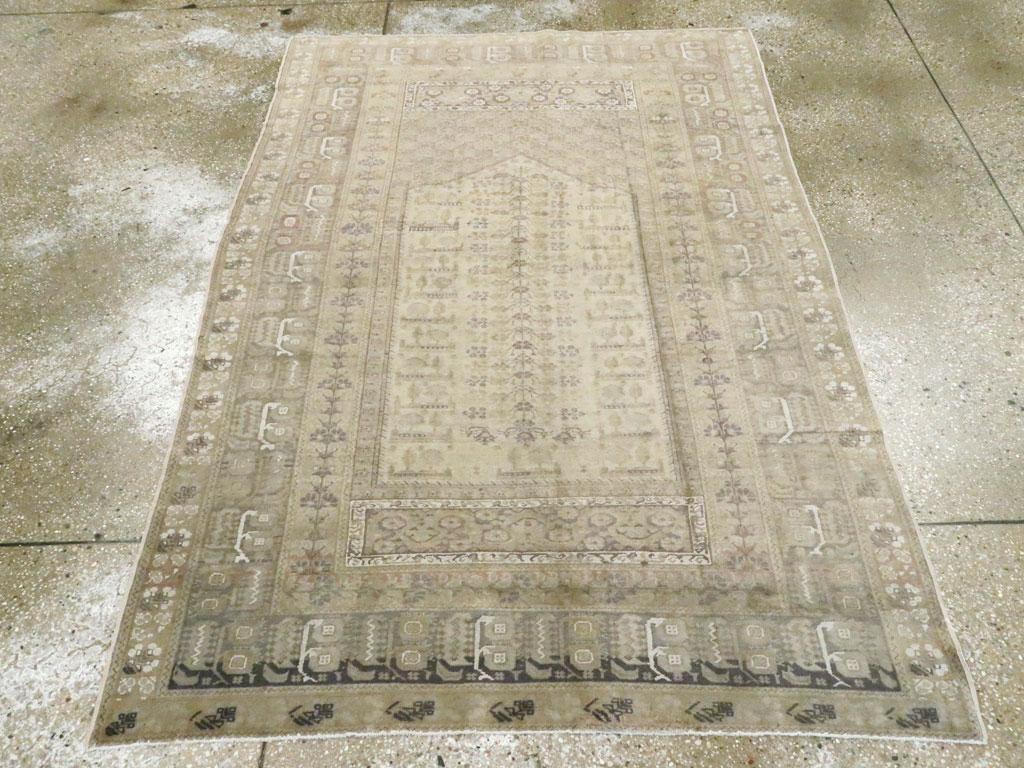 A vintage Turkish Kayseri accent rug handmade during the mid-20th century.

Measures: 4' 3