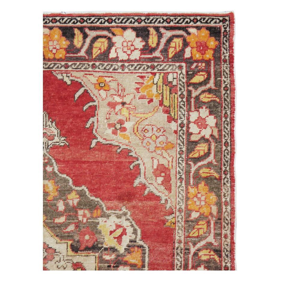 A vintage Turkish Oushak accent rug handmade during the mid-20th century.

Measures: 5' 6
