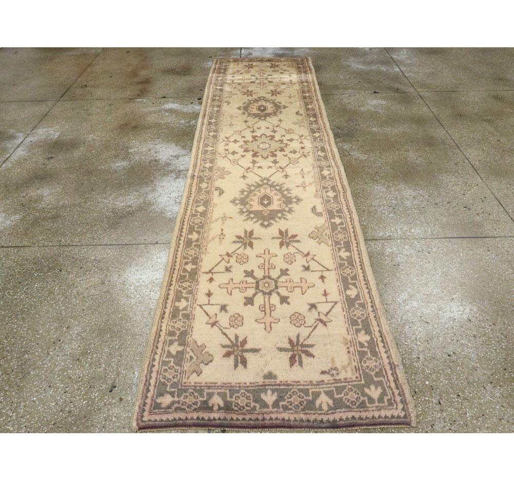 Hand-Knotted Mid-20th Century Handmade Turkish Oushak Runner For Sale