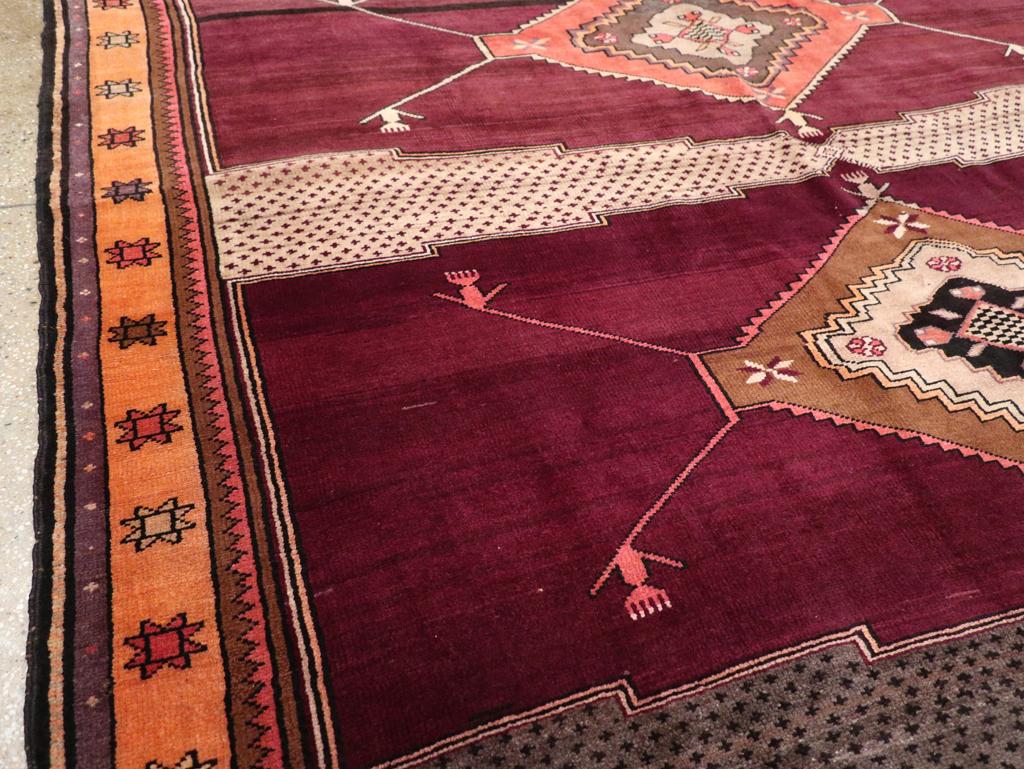 Hand-Knotted Mid-20th Century Handmade Turkish Tribal Long & Narrow Room Size Carpet For Sale