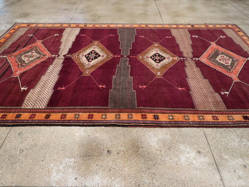 Mid-20th Century Handmade Turkish Tribal Long & Narrow Room Size Carpet In Excellent Condition For Sale In New York, NY