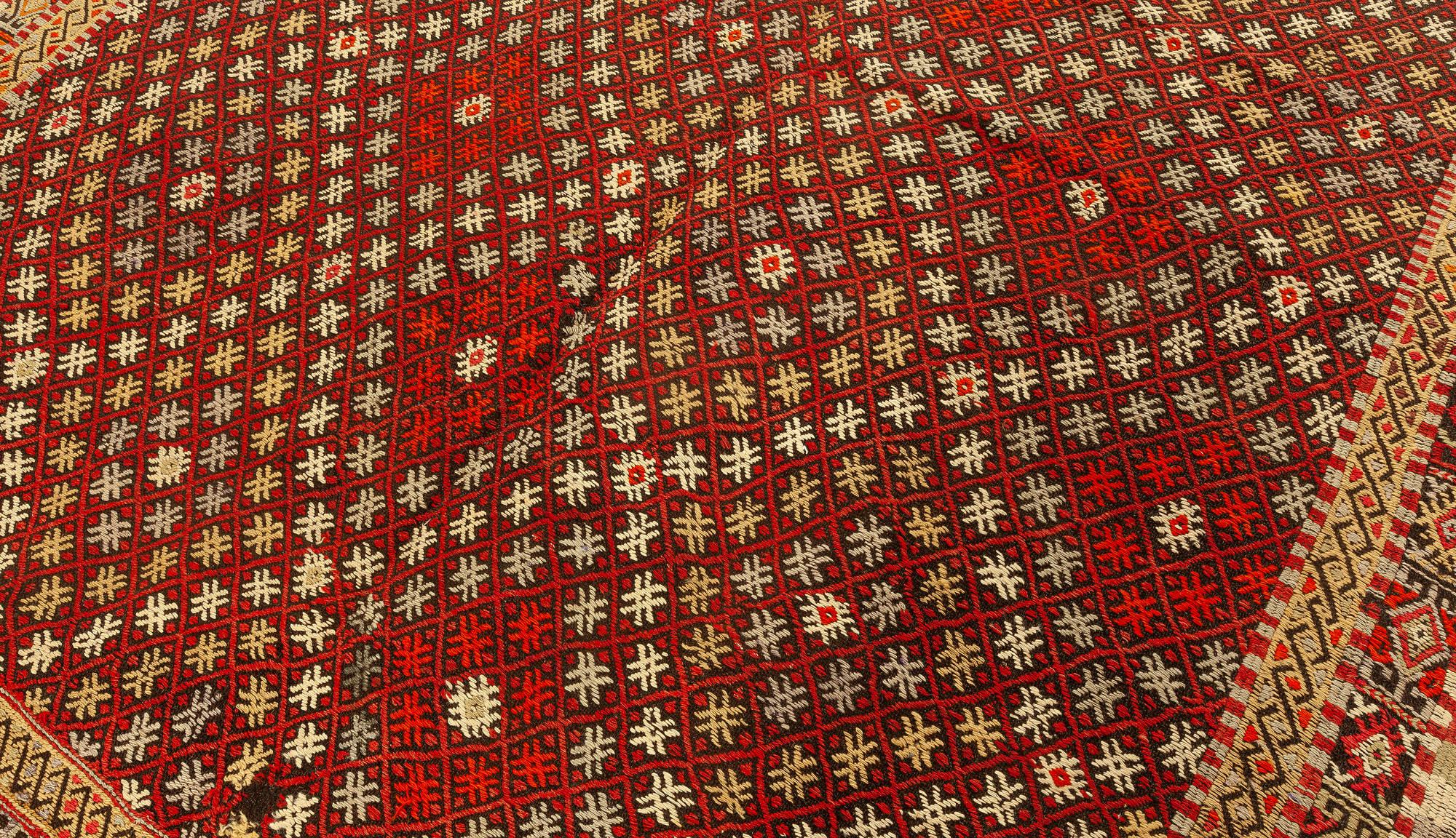 Mid-20th Century handmade vintage rag rug.
Size: 7'0