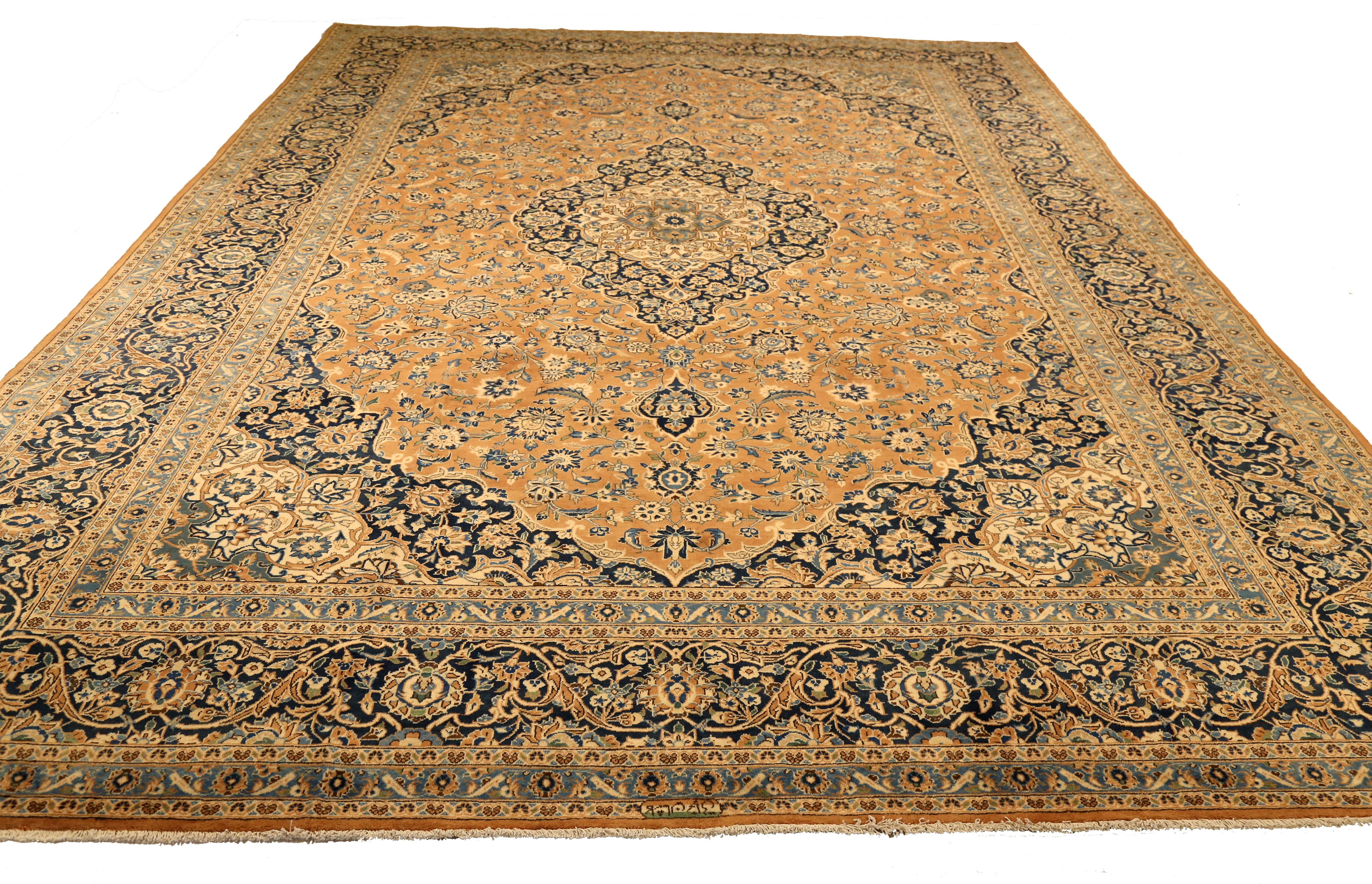 Mid-20th century hand-woven Persian area rug made from fine wool and all-natural vegetable dyes that are safe for people and pets. It features traditional Kashan weaving depicting intricate floral and botanical patterns often in bold colors.