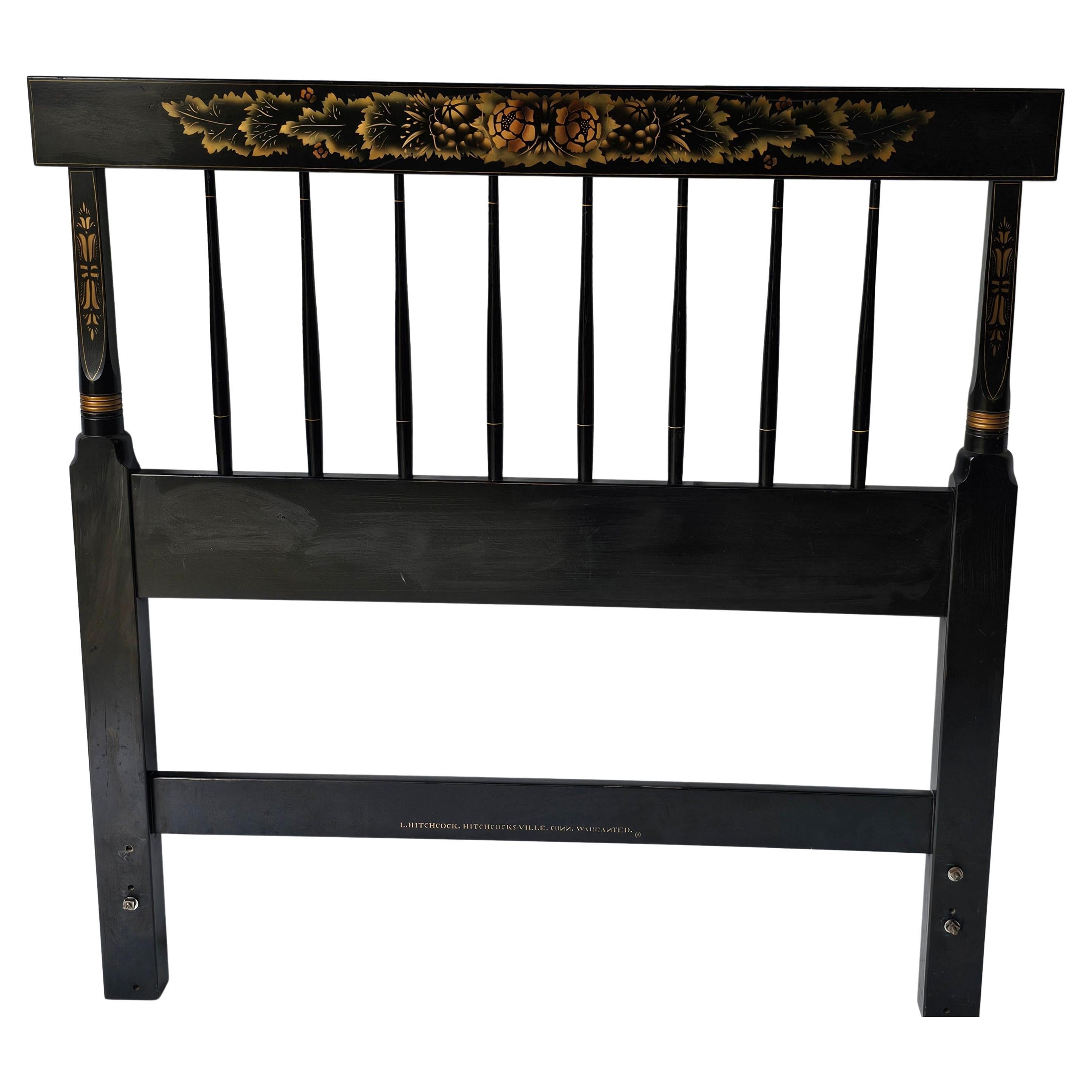 Mid-20th Century Hitchcock Ebonized and Decorated Twin Size Headboard.
 Its dimensions are approximately 40 inches wide x 41 inches tall
