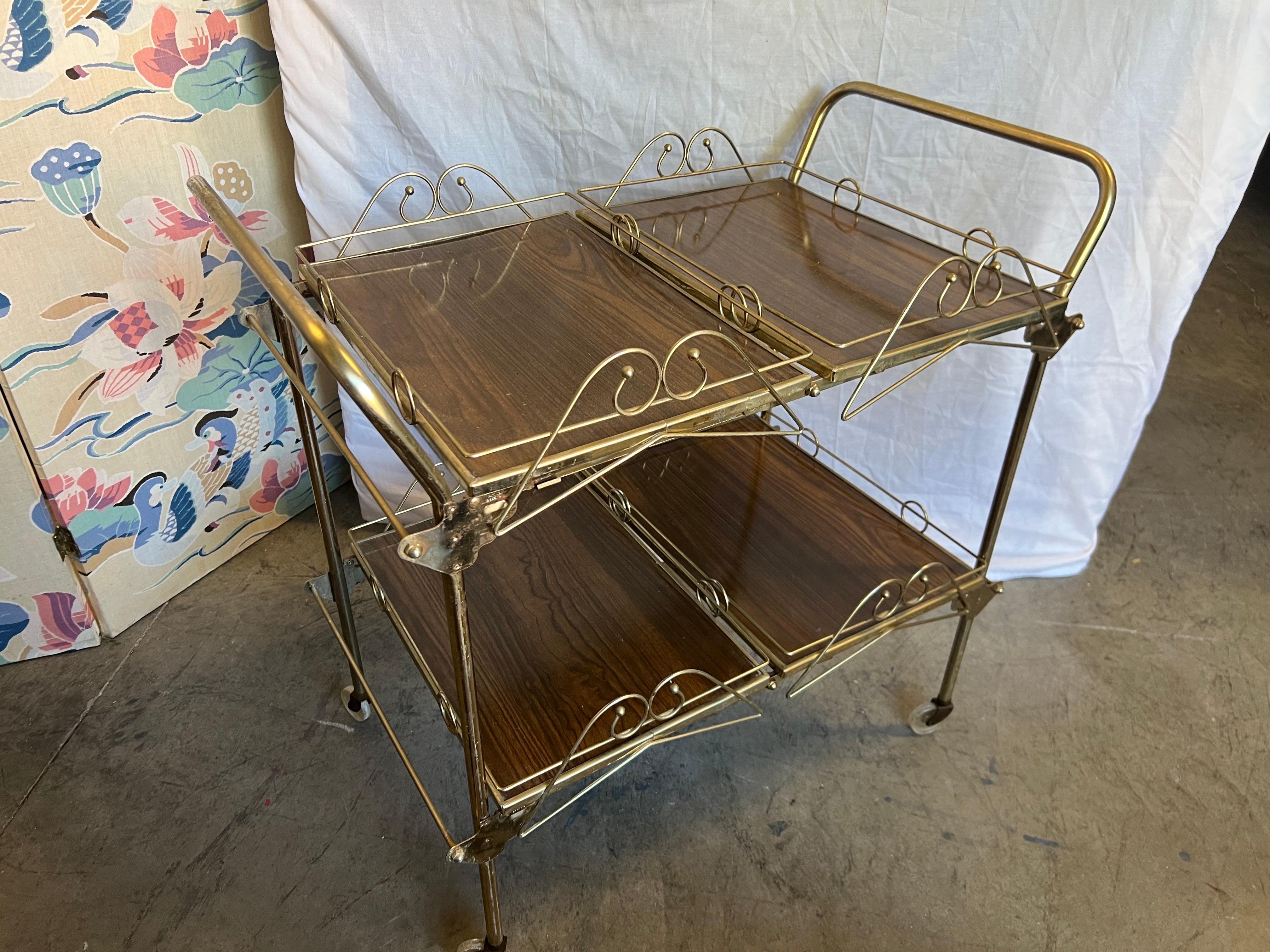 Mid-20th Century Hollywood Regency Brass and Walnut Tone Serving Cart In Good Condition For Sale In Charleston, SC