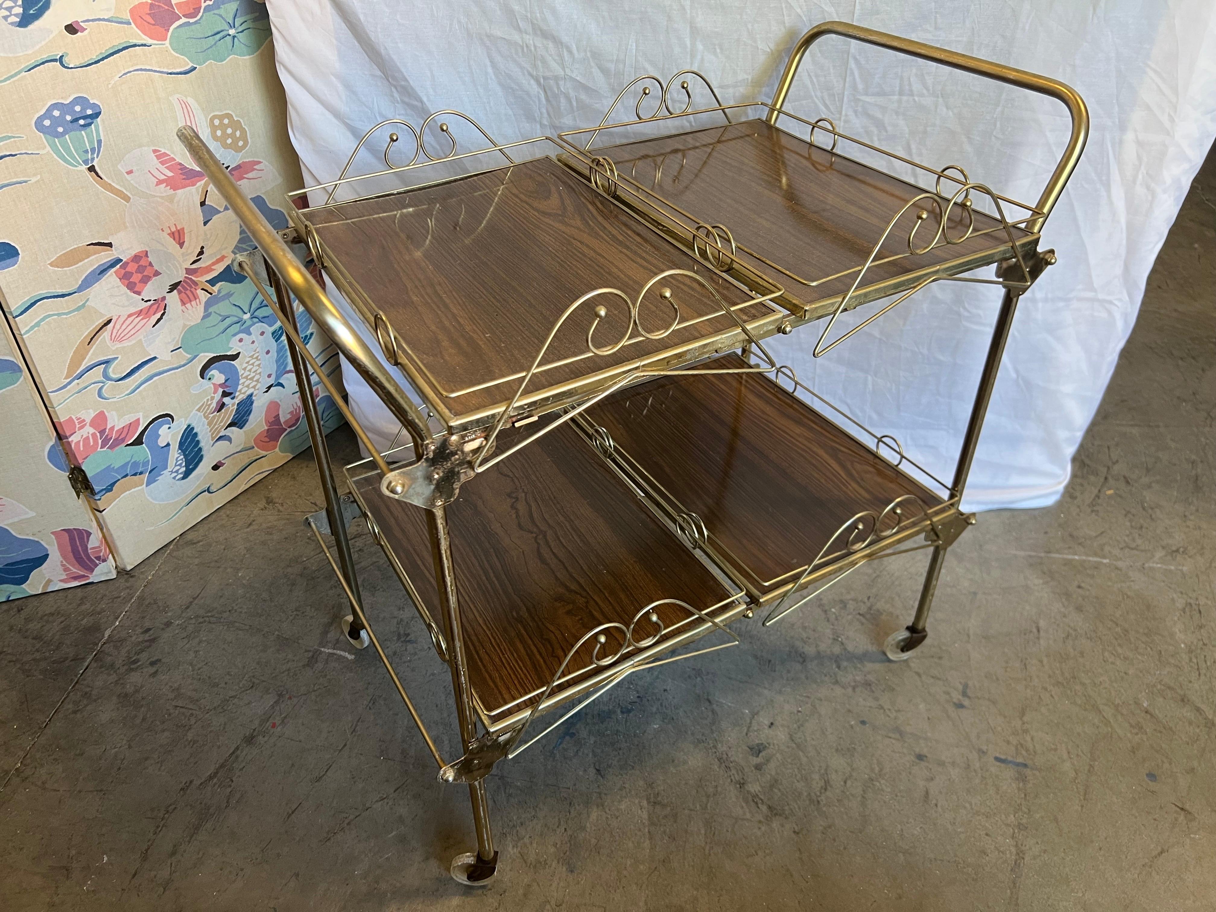 Metal Mid-20th Century Hollywood Regency Brass and Walnut Tone Serving Cart For Sale