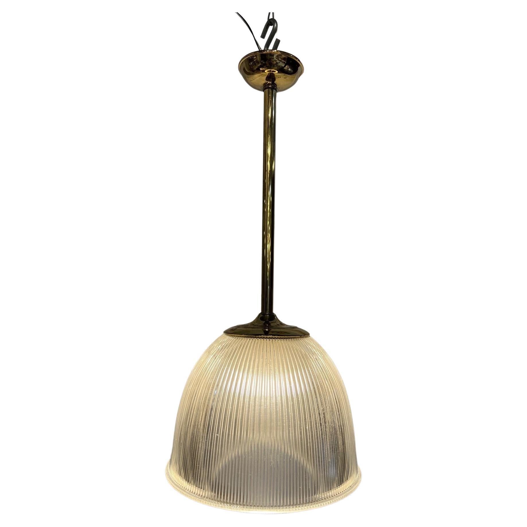 Seven Mid-20th Century Holophane Pyrex Glass Globe Pendant Light with Brass Pole For Sale
