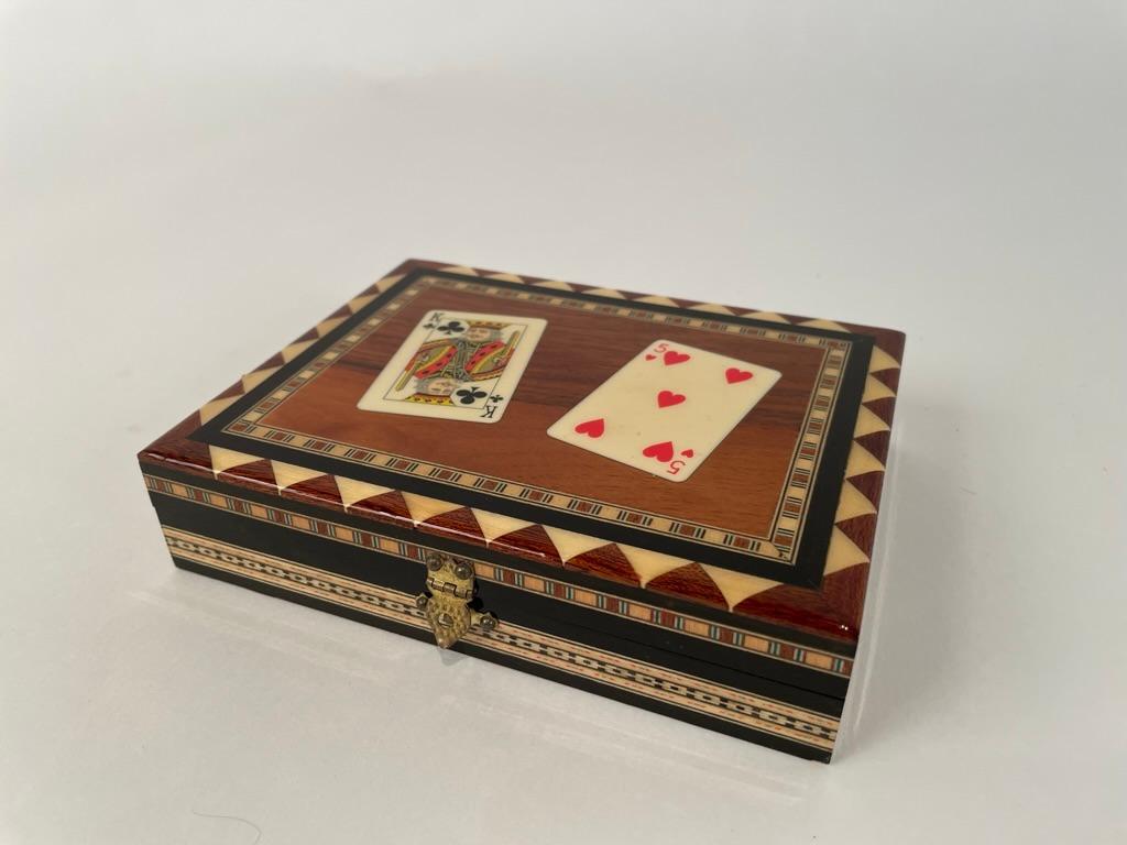 Great little box for your decks of playing cards, beautifully inlaid with rosewood, holly, ebony and bone with two playing cards affixed to the lid all with a protective layer of clear lacquer. A wonderful decorative piece or gift for the card