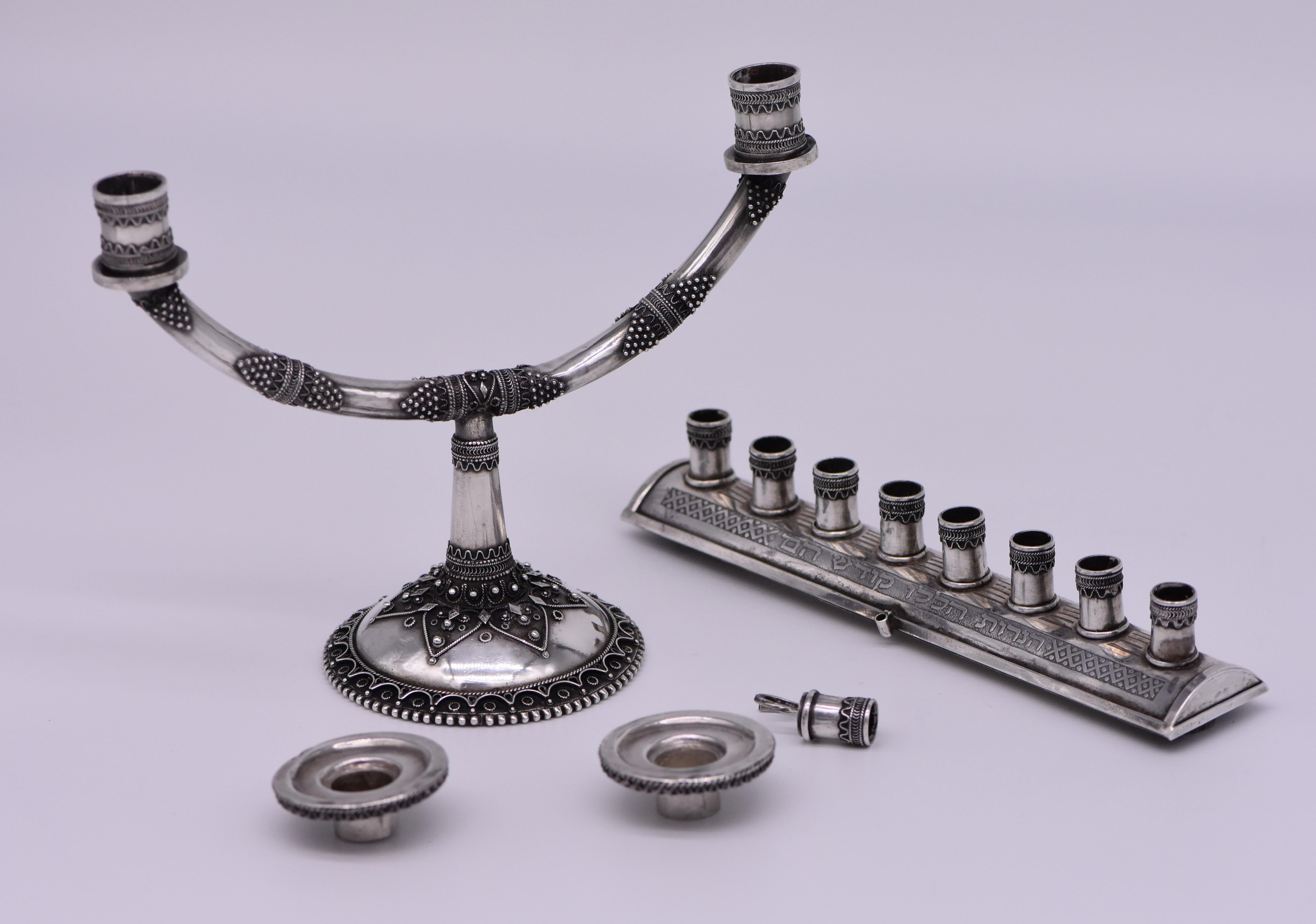 Handmade silver Hanukkah lamp Menorah by Bezalel. Decorated with filigree work, and with acid etched Hebrew text: 