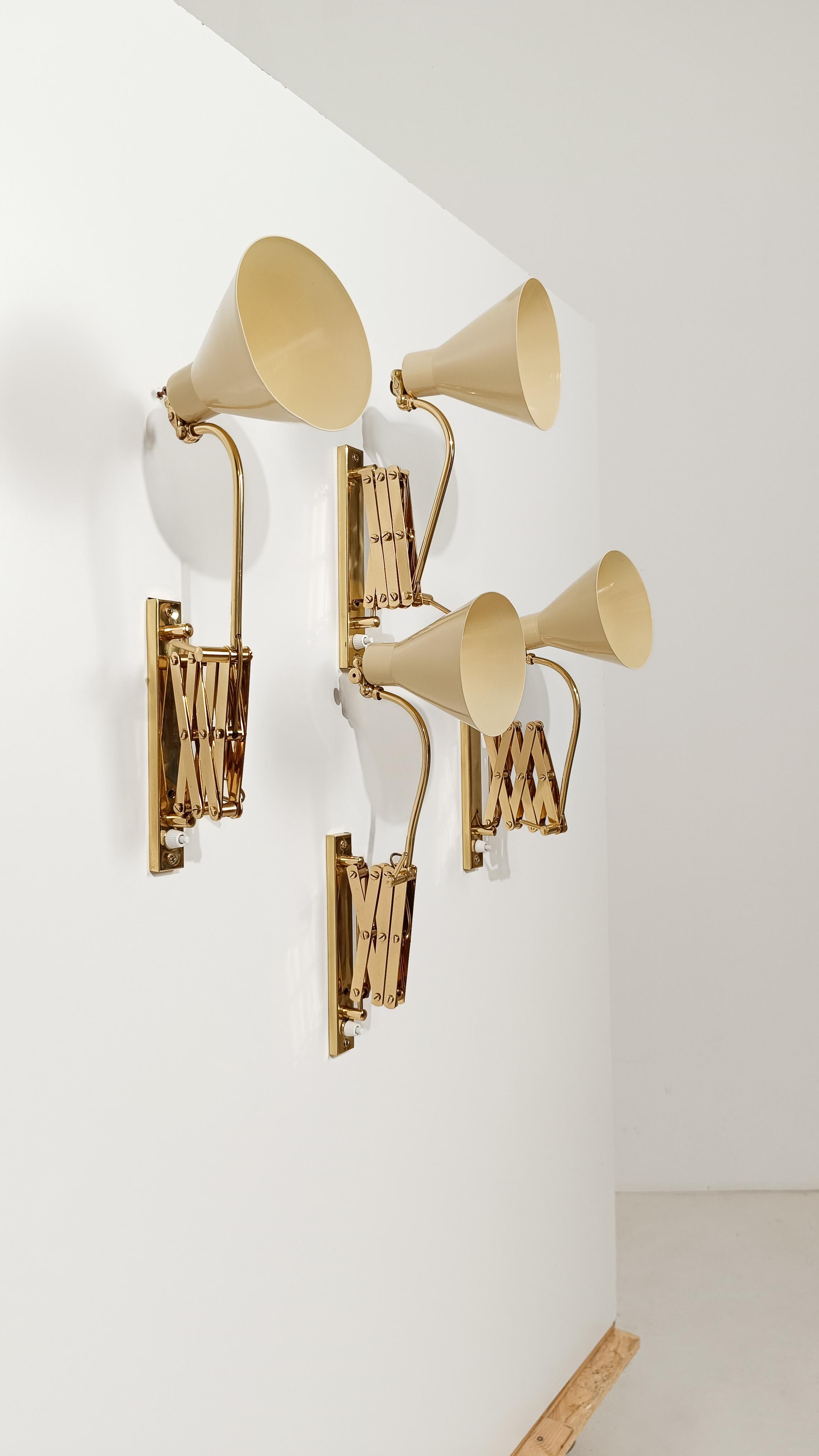 Mid-Century Modern Mid 20th Century Italian Adjustable Wall Lights in Brass & Creamy White Metal For Sale